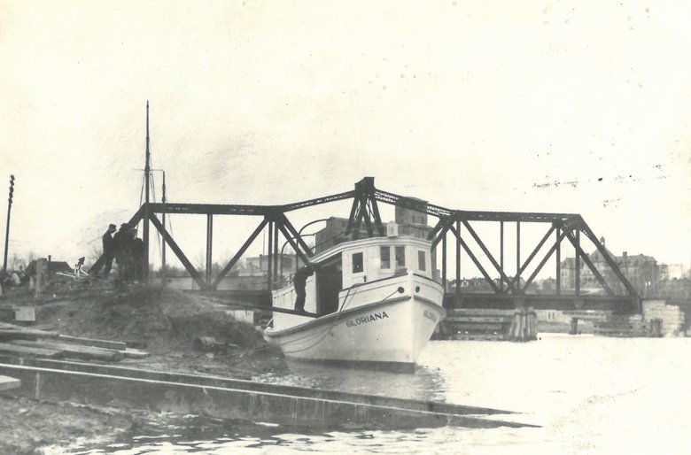 Image of GLORIANNA sitting in river outside Burger Boat Company