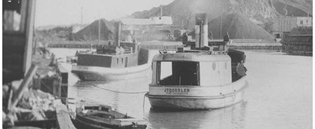 Image of J.T. BOSSLER sitting in river