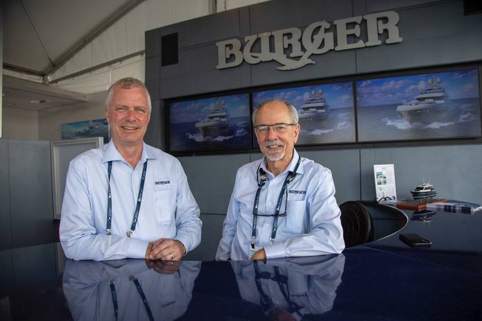 Image of Ron Cleveringa and Jim Ruffolo inside Burger Show Booth