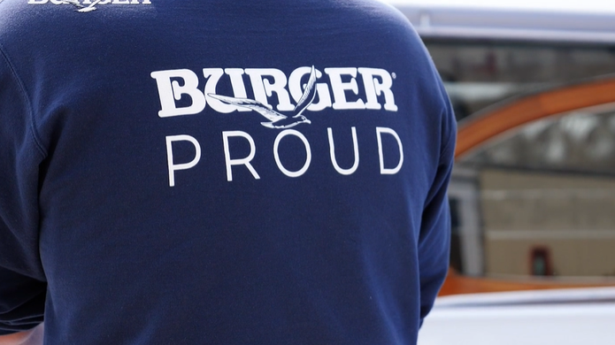Back of shirt that says Burger Proud
