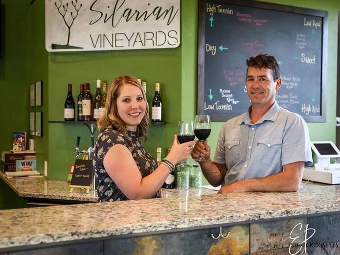 Image of Jeremy and Brenda Haese lifting a glass of wine
