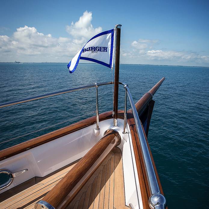 Burger flag on the bow of a yacht